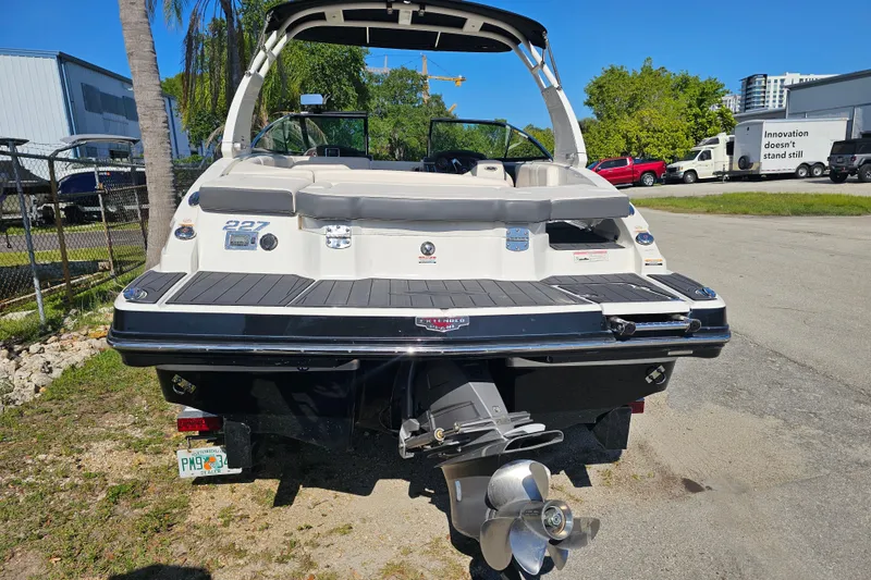 Slide: The Image of 2017 Chaparral 227 SSX boat rear view with propeller and swim platform. - 6