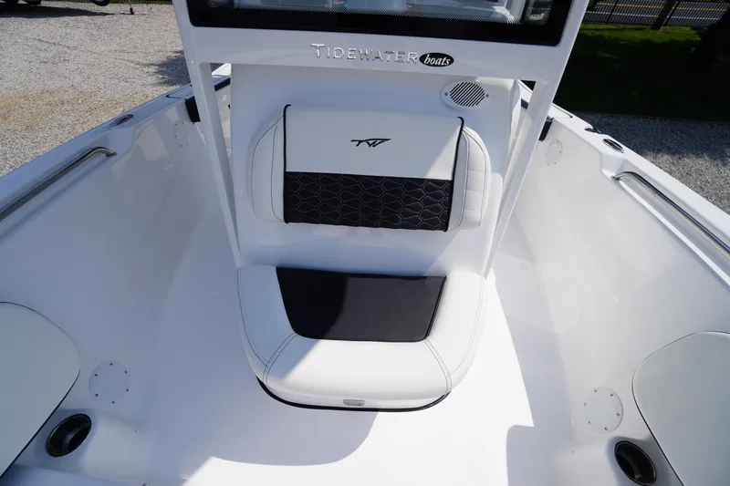 Slide: The Image of 2026 Tidewater 198 CC Adventure boat interior with cushioned seating. - 15