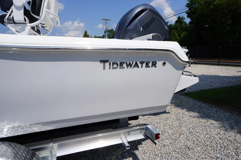 Slide: The Image of 2026 Tidewater 198 CC Adventure boat on trailer, featuring Yamaha engine. - 3