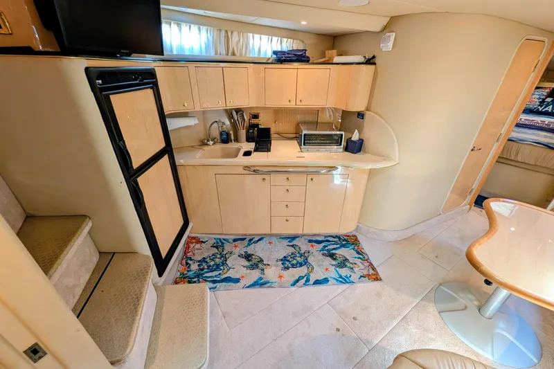 Slide: The Image of Control panel of a 2001 Sea Ray 410 Sundancer - Magical Waves - 22