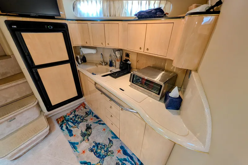Slide: The Image of one of Three Thermostat control panels on 2001 Sea Ray 410 Sundancer - 24