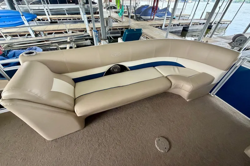 Slide: The Image of Beige seating on 2013 Harris Solstice 240 pontoon boat at dock. - 10