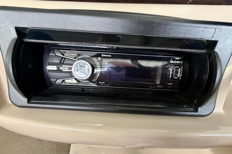 Slide: The Image of Sony stereo system in a 2013 Harris Solstice 240 boat dashboard. - 17