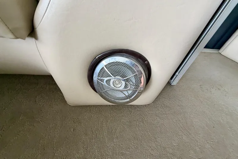Slide: The Image of Speaker installed on a 2013 Harris Solstice 240 boat interior. - 19