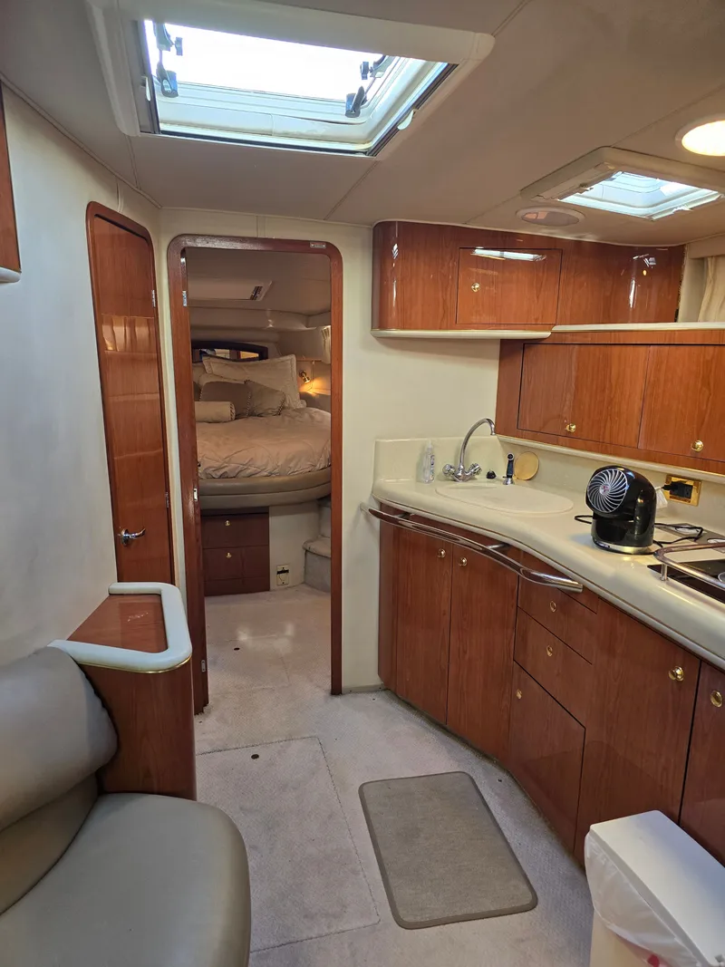 Slide: The Image of Interior of 1998 Sea Ray 450 Sundancer yacht. - 13