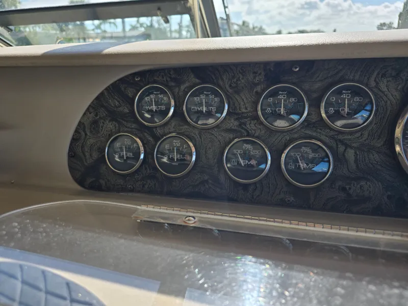 Slide: The Image of Dashboard of a 1998 Sea Ray 450 Sundancer boat. - 29