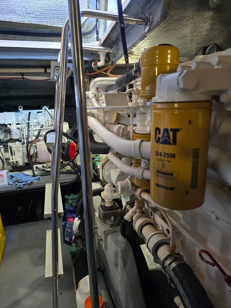 Slide: The Image of Engine room of 1998 Sea Ray 450 Sundancer with CAT filter. - 37