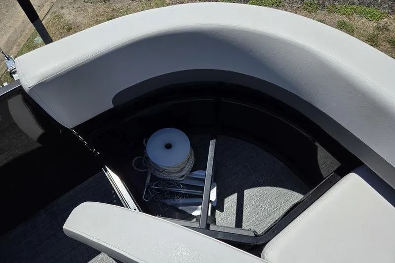 Slide: The Image of Storage compartment on 2024 Godfrey Mighty G 1476 C boat with seating and rope. - 19