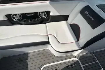 Slide: The Image of Interior of a 2019 Bryant 210 boat with sleek seating and speaker system. - 7