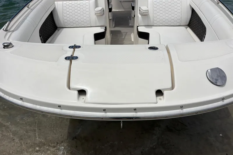 Slide: The Image of 2019 Sea Ray SDX 270 Outboard boat with spacious seating and sleek design. - 10