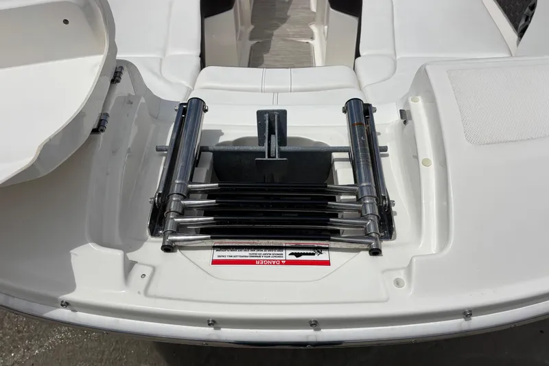 Slide: The Image of 2019 Sea Ray SDX 270 Outboard swim platform with retractable ladder. - 11