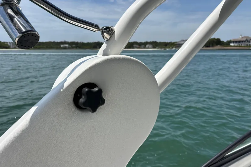 Slide: The Image of Close-up of 2019 Sea Ray SDX 270 Outboard boat detail with ocean backdrop. - 48