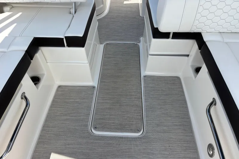 Slide: The Image of 2019 Sea Ray SDX 270 Outboard interior with sleek seating and modern flooring. - 49