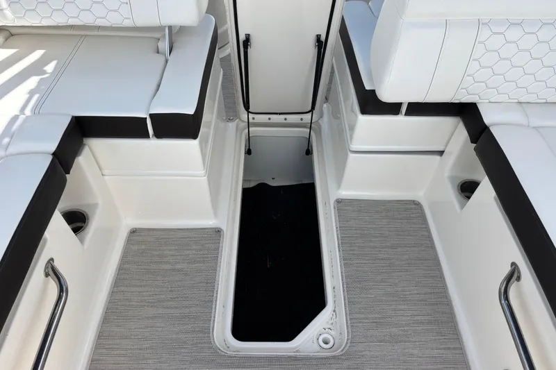 Slide: The Image of 2019 Sea Ray SDX 270 Outboard interior seating and flooring detail. - 50