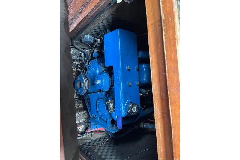 Slide: The Image of Blue engine inside a wooden compartment, TA Chaio CT47, 1984 model. - 16