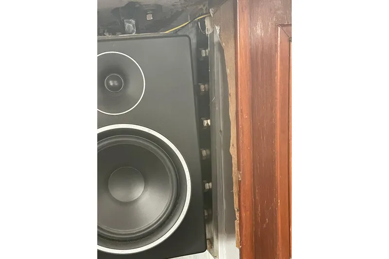 Slide: The Image of Vintage TA Chaio CT47 speaker from 1984, partially visible near wooden panel. - 19