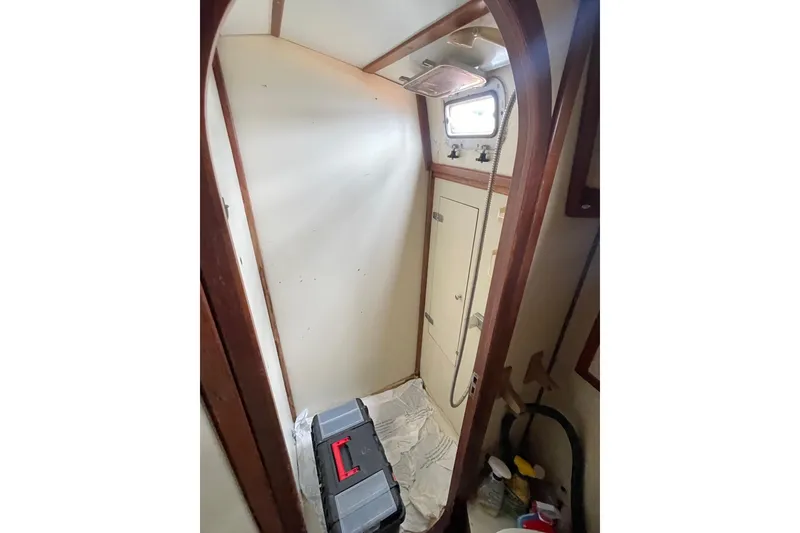 Slide: The Image of Narrow boat cabin interior with storage, window, and toolbox; TA Chaio CT47, 1984 model. - 22