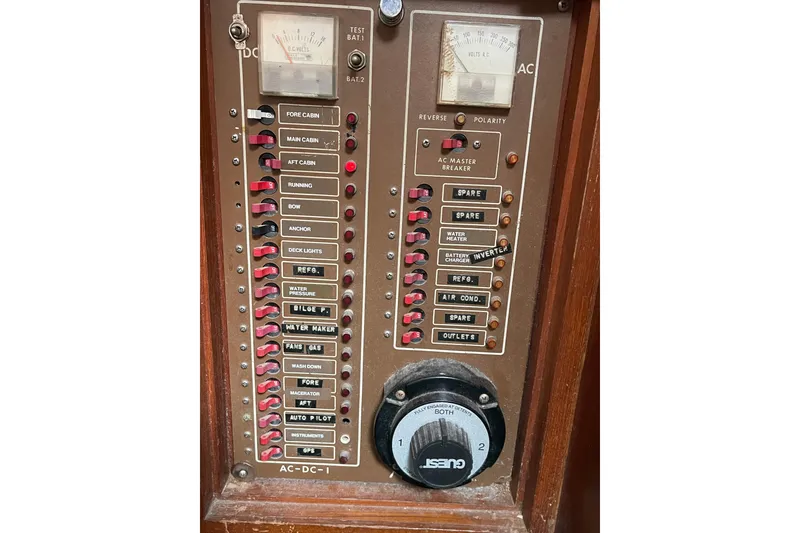 Slide: The Image of Electrical control panel of a 1984 TA Chaio CT47 boat with labeled switches and gauges. - 7