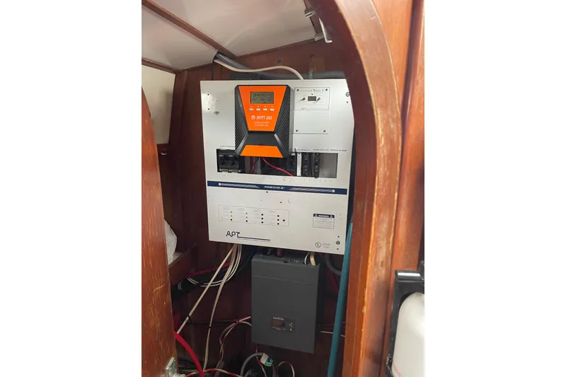 Slide: The Image of Electrical panel inside a 1984 TA Chaio CT47 boat, featuring an MPPT solar charge controller. - 8