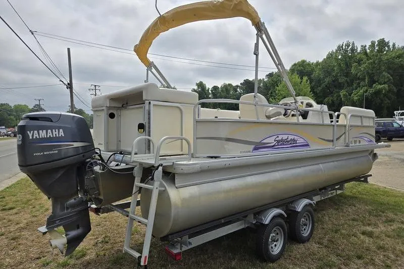 Slide: The Image of 2008 Sweetwater 2386RE pontoon boat with Yamaha motor on trailer. - 3