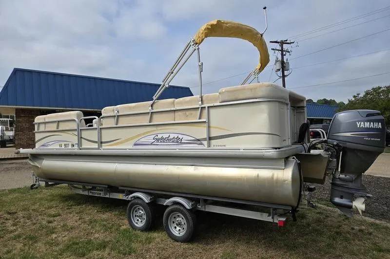 Slide: The Image of 2008 Sweetwater 2386RE pontoon boat with Yamaha motor on trailer. - 4