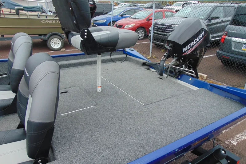 Slide: The Image of 2020 Crestliner 1700 Storm boat with Mercury outboard motor and seating. - 7