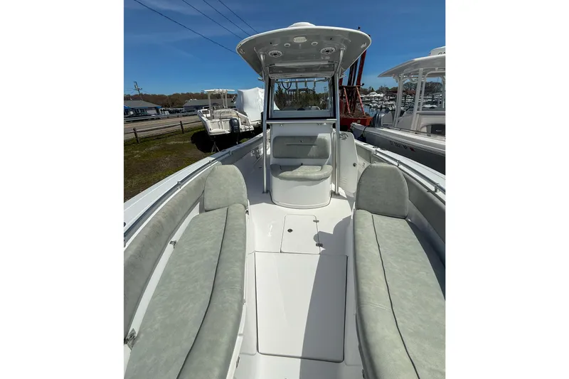 Slide: The Image of 2019 Sportsman Open 282 Center Console boat with spacious seating and modern design. - 14
