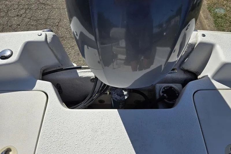 Slide: The Image of 2017 Carolina Skiff 19 DLX boat engine and deck view. - 3