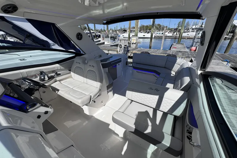 Slide: The Image of Luxurious 2021 Sea Ray Sundancer 320 yacht interior with plush seating and modern design. - 10
