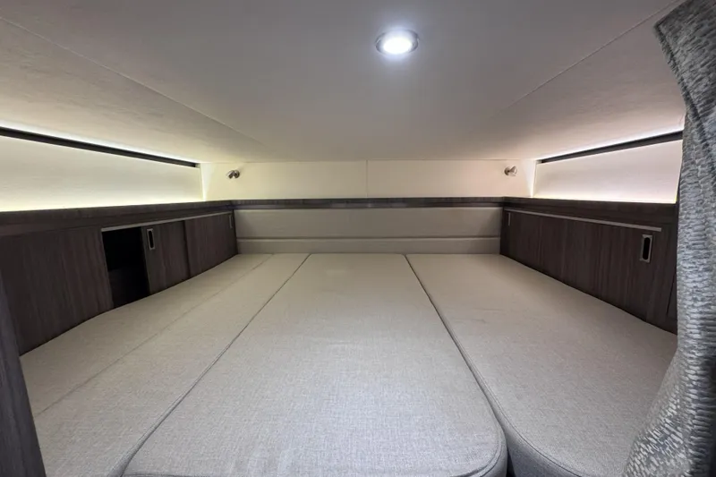 Slide: The Image of Interior cabin of 2021 Sea Ray Sundancer 320 with modern design and ambient lighting. - 13