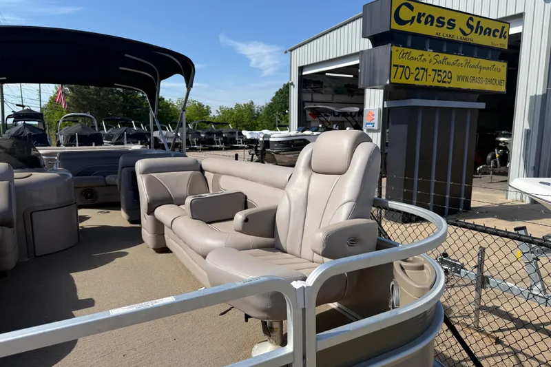 Slide: The Image of 2008 Premier 250 Escapade pontoon boat at Grass Shack dealership, sunny day. - 6