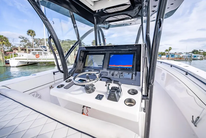 Slide: The Image of 2020 SeaHunter 35 Tournament boat helm with advanced navigation system. - 29