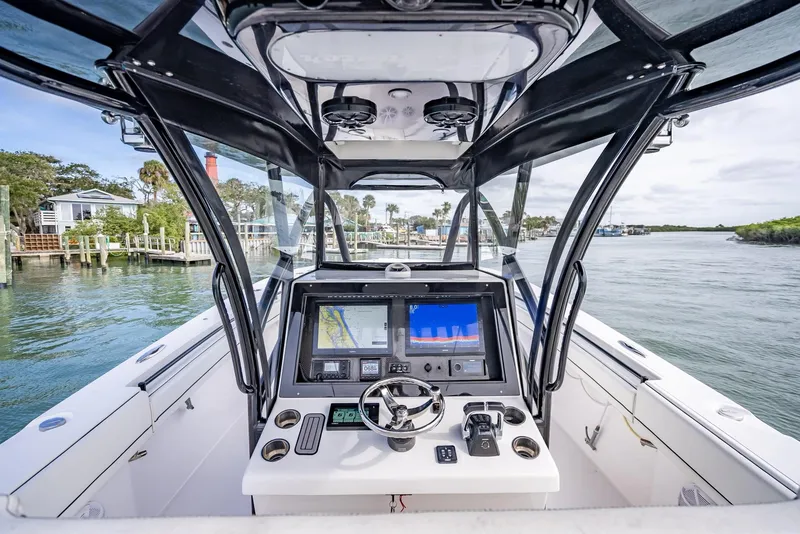 Slide: The Image of Cockpit view of 2020 SeaHunter 35 Tournament boat with advanced navigation system. - 31