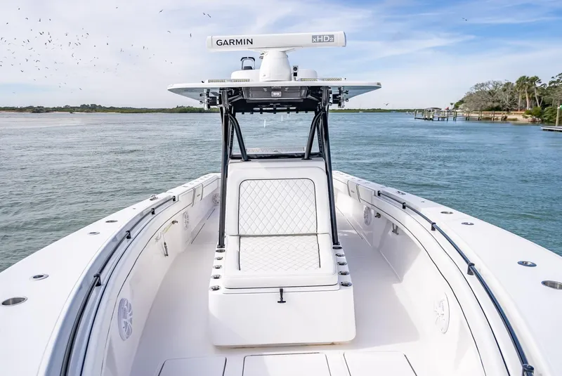 Slide: The Image of 2020 SeaHunter 35 Tournament boat on calm waters with Garmin radar. - 34