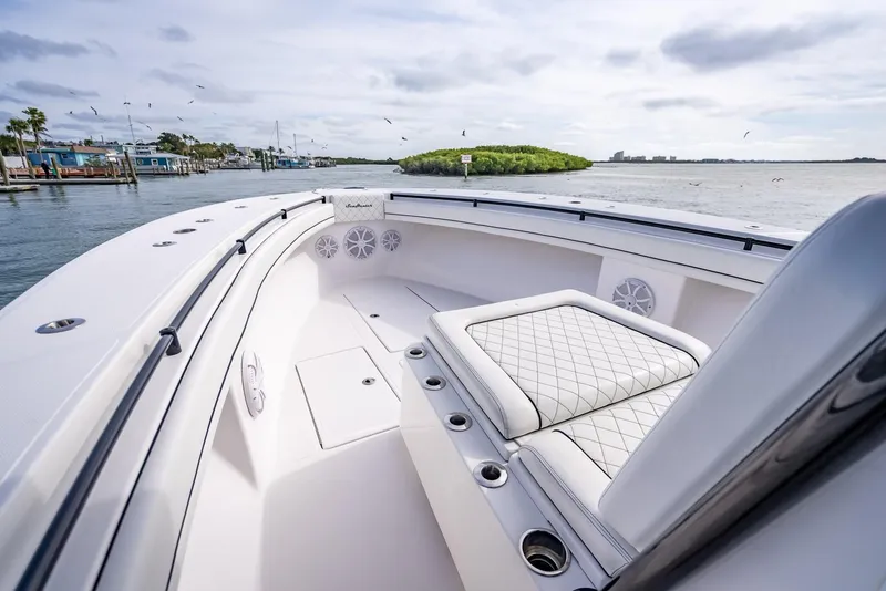 Slide: The Image of 2020 SeaHunter 35 Tournament boat with luxurious seating and scenic water view. - 38
