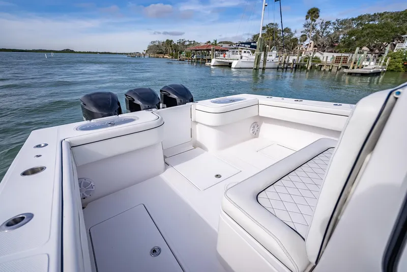 Slide: The Image of 2020 SeaHunter 35 Tournament boat with spacious deck and twin outboard motors. - 40