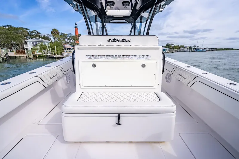 Slide: The Image of 2020 SeaHunter 35 Tournament boat interior with seating and storage. - 41