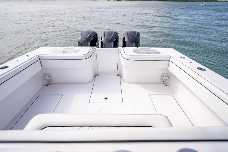 Slide: The Image of 2020 SeaHunter 35 Tournament boat stern with triple outboard motors. - 43