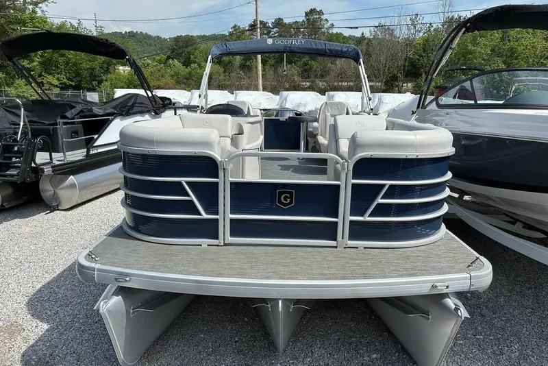 Slide: The Image of 2022 Godfrey Xperience 2286 SBX pontoon boat with blue exterior and spacious seating. - 4