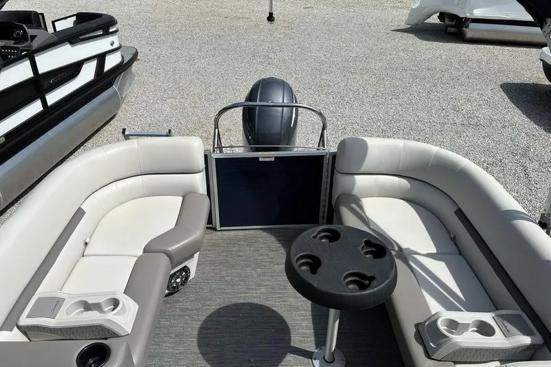 Slide: The Image of 2022 Godfrey Xperience 2286 SBX pontoon boat interior with seating and cup holders. - 5