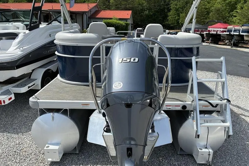 Slide: The Image of 2022 Godfrey Xperience 2286 SBX pontoon boat with 150 HP engine, docked outdoors. - 7
