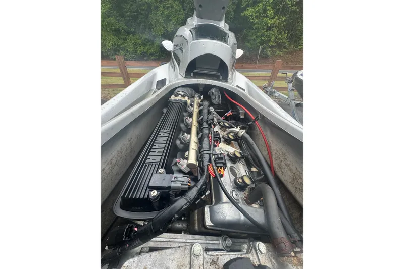 Slide: The Image of Engine compartment of a 2009 Yamaha VX Cruiser, showcasing internal components and wiring. - 4