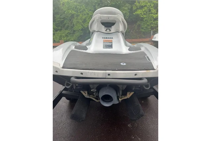 Slide: The Image of Rear view of a 2009 Yamaha VX Cruiser jet ski on a wet surface. - 5