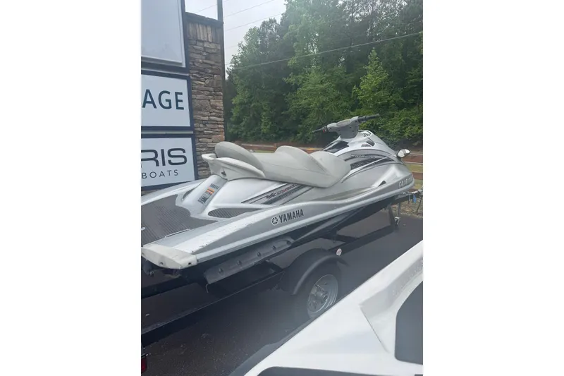 Slide: The Image of 2009 Yamaha VX Cruiser jet ski on trailer, parked outdoors. - 8