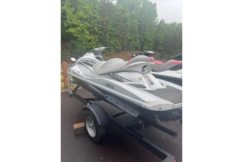 Slide: The Image of 2009 Yamaha VX Cruiser jet ski on trailer, parked outdoors. - 9