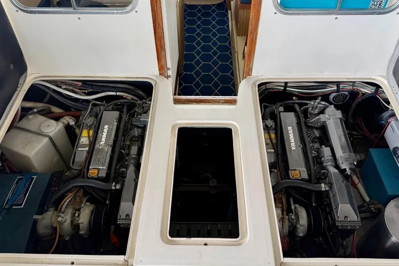 Slide: The Image of Engine compartment of a 1981 Bertram 28 Flybridge Cruiser with Yanmar engines. - 3