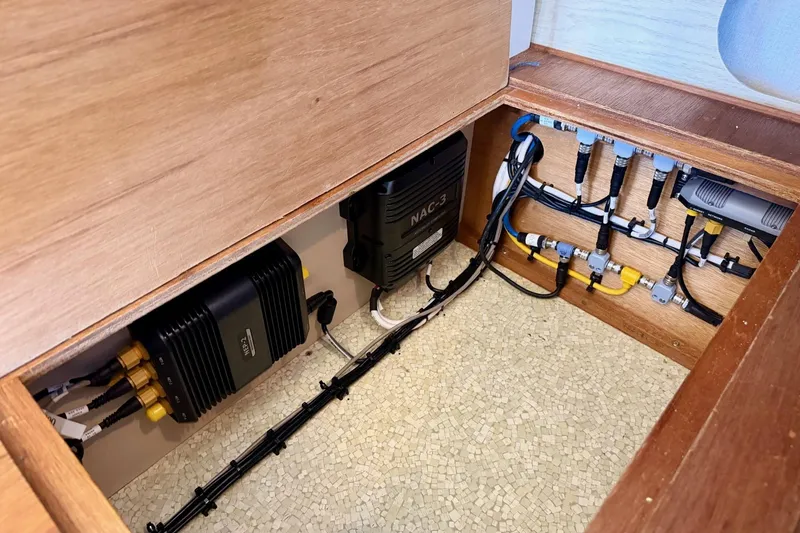 Slide: The Image of Electrical components and wiring inside a 1981 Bertram 28 Flybridge Cruiser boat. - 7