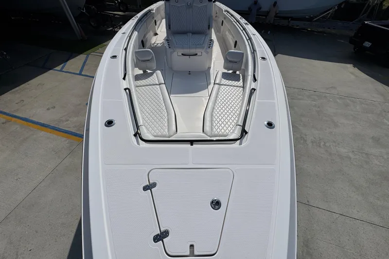 Slide: The Image of 2024 Fountain Bluewater 38 Tournament Edition boat with spacious deck and seating. - 17