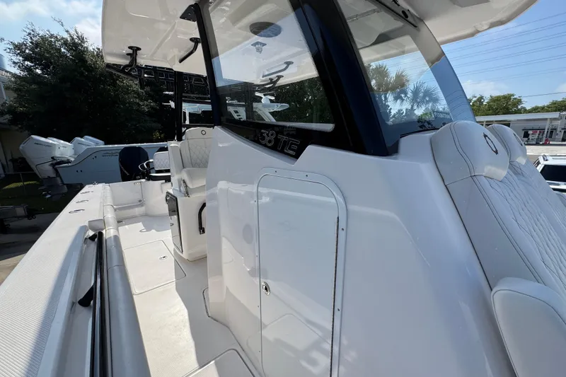 Slide: The Image of 2024 Fountain Bluewater 38 Tournament Edition boat interior with seating and helm. - 21