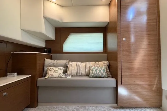 Slide: The Image of Luxurious interior of 2016 Cruisers Yachts 390 Express Coupe with cozy seating and cushions. - 25